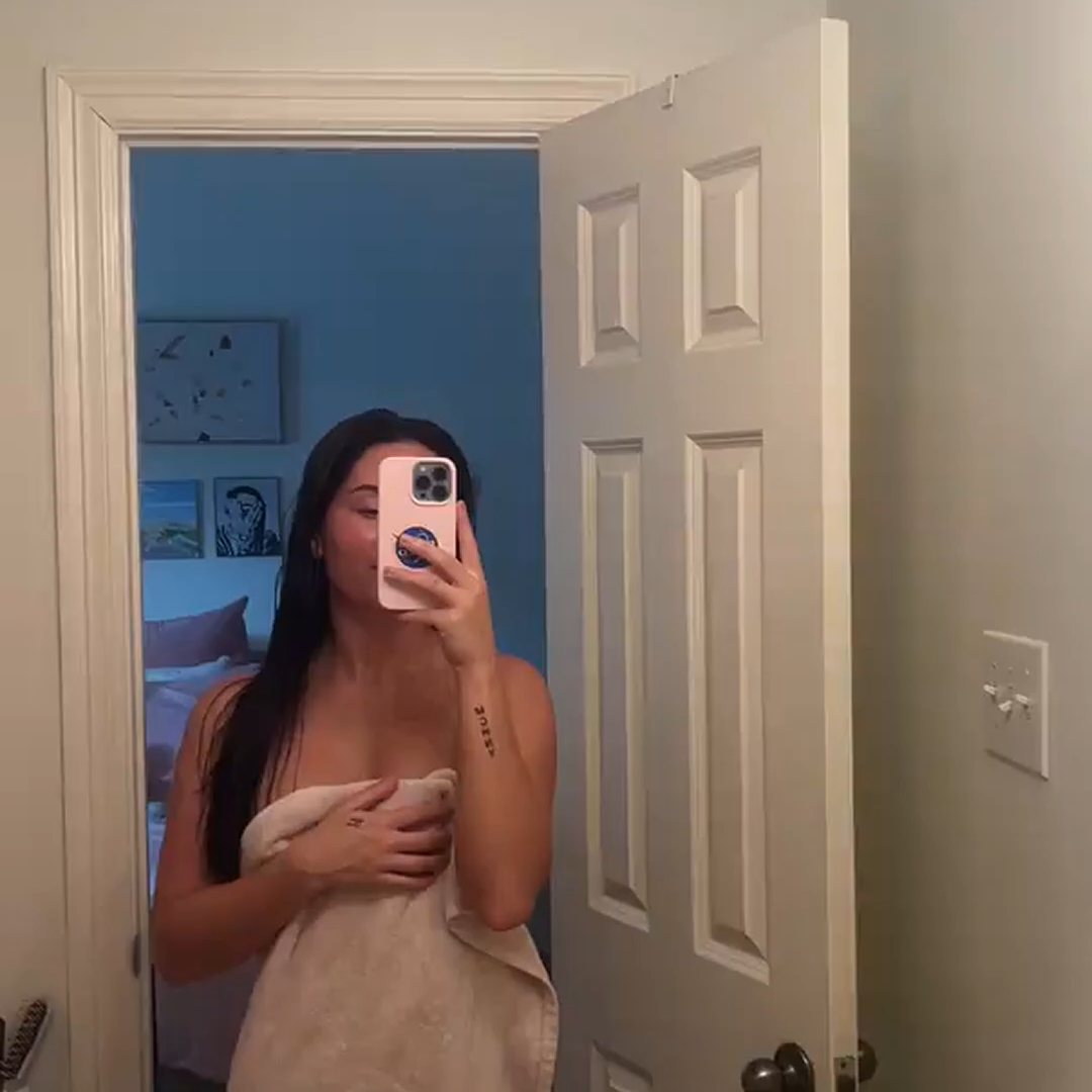 asian babe in a towel after a bath